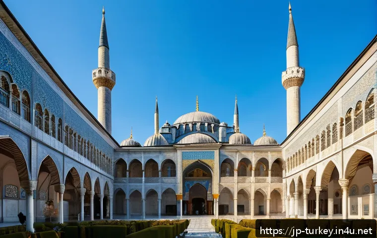 이스탄불 톱카프 궁전 투어 - A majestic view of Topkapi Palace courtyard blending Ottoman Islamic and Byzantine architectural sty...